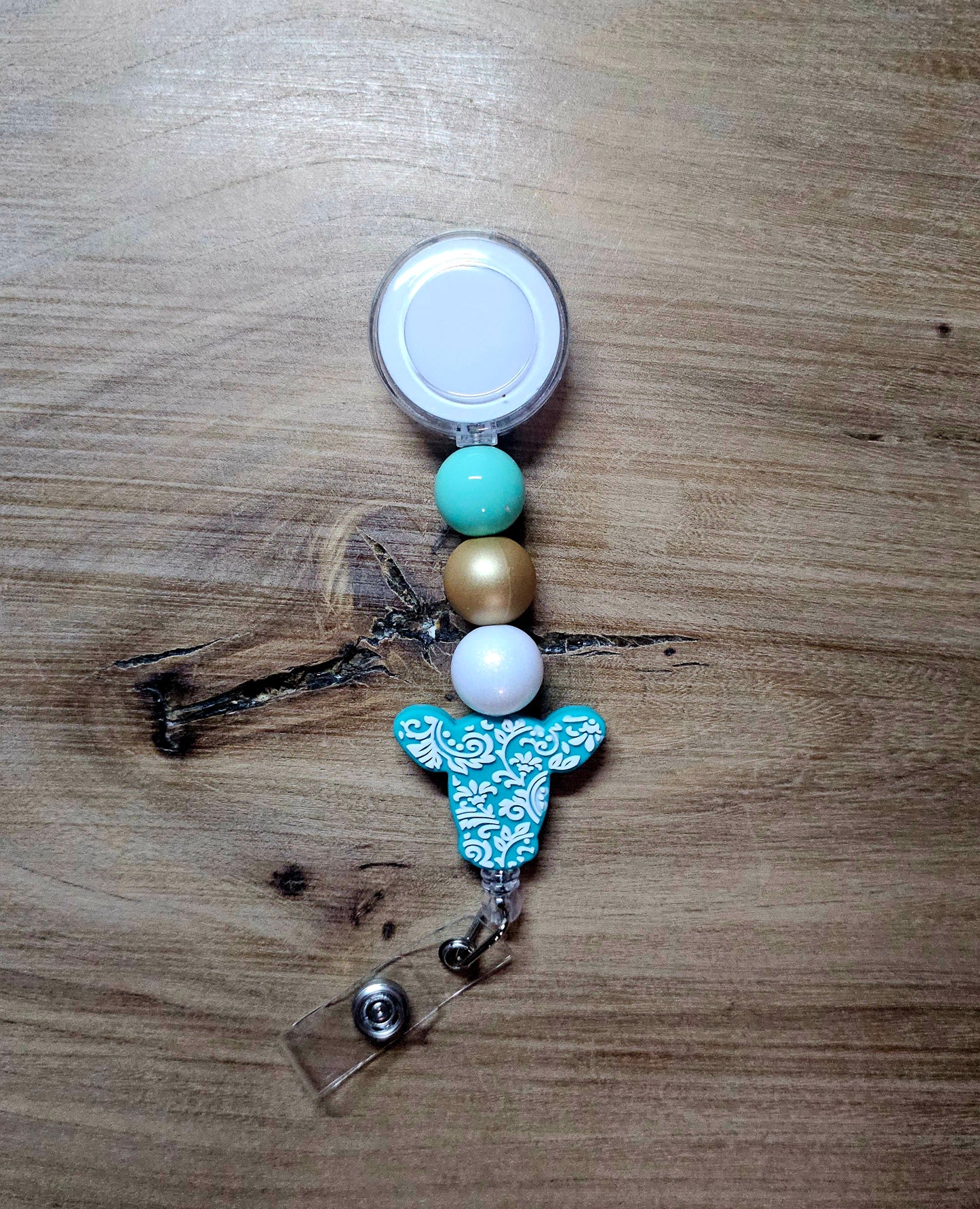 Tooled Cow Head Badge Reel