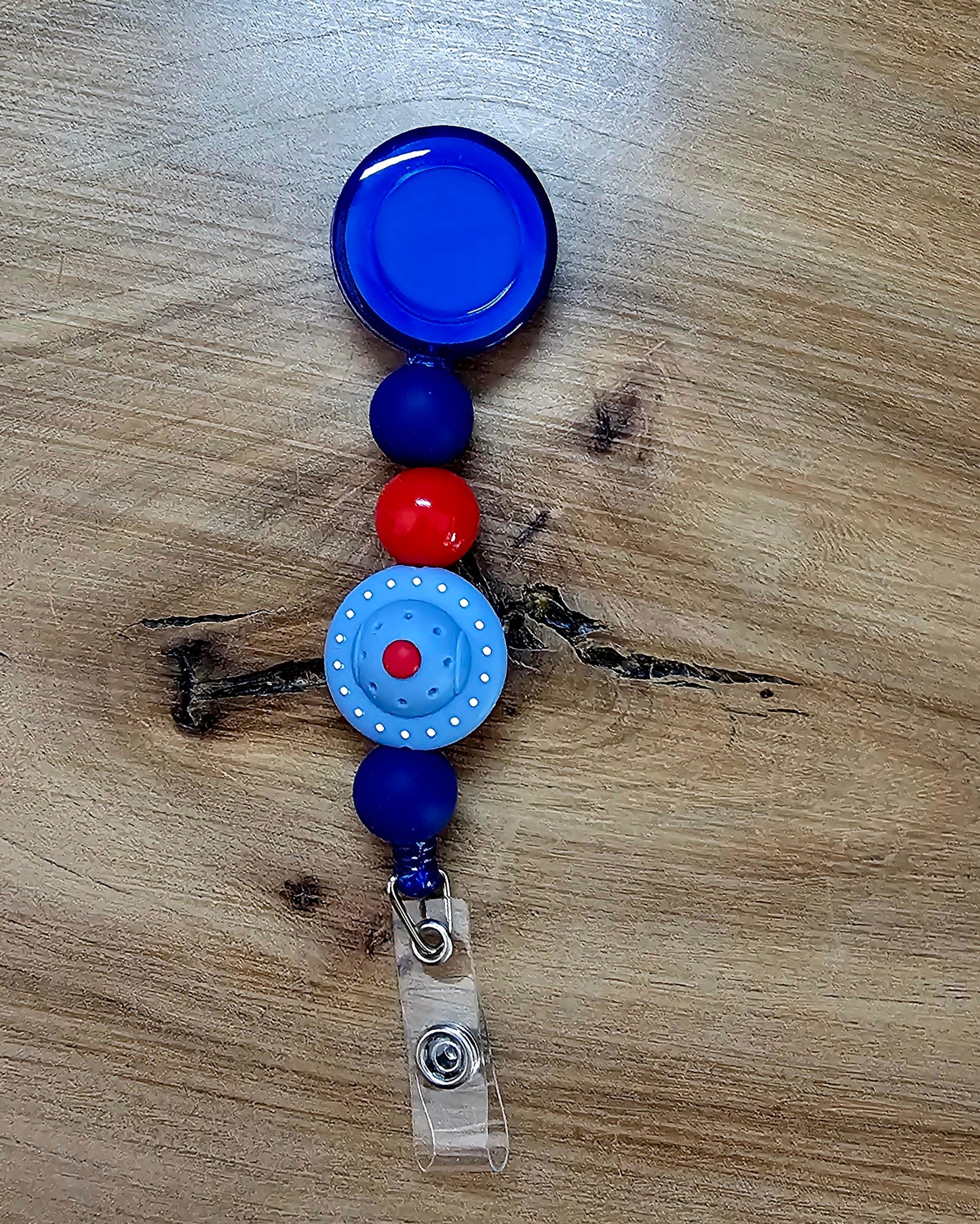 The Flying Saucer Badge Reel