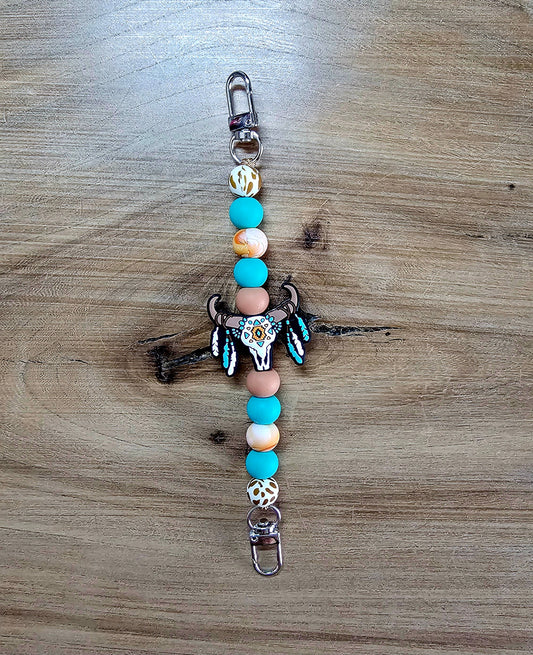 Painted and Feathered Bull Skull purse strap